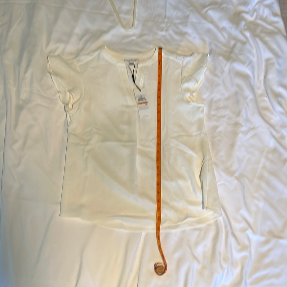 Never worn, off white short sleeve women’s blouse